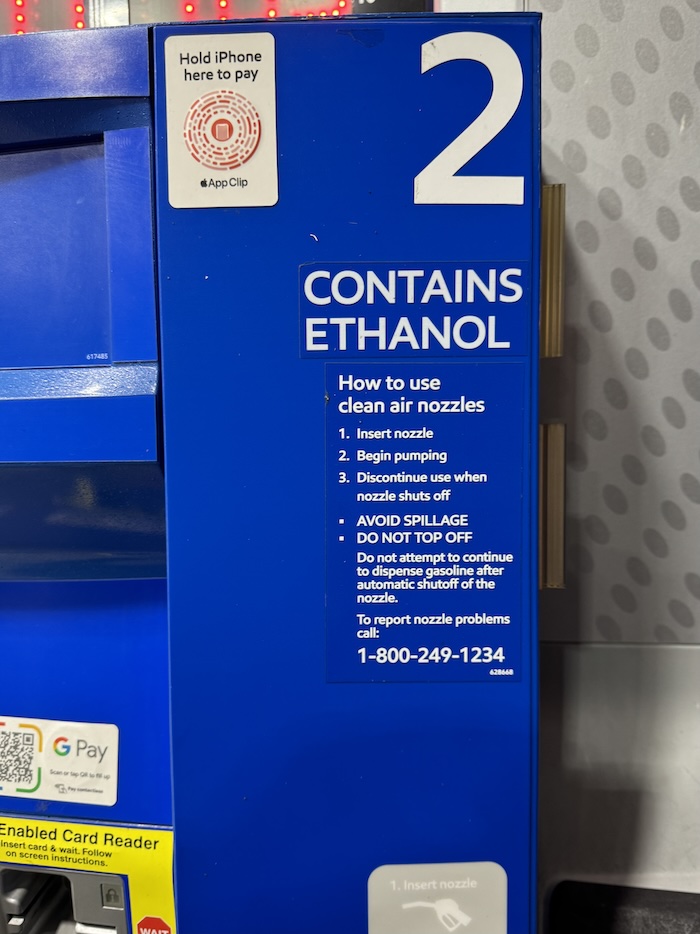 Exxon Mobil gas station pump with an App Clip sticker.